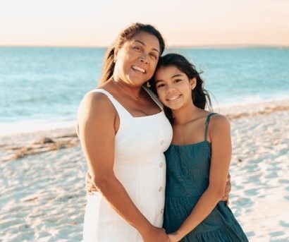 A mum and her daughter at the beach