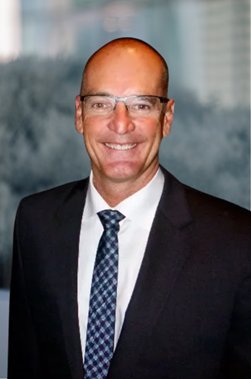 Person in a suit smiling