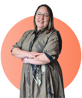 Person smiling and crossing their arms